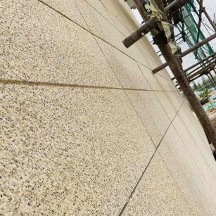 衢州 黄金麻花岗岩荔枝面外墙干挂石材效果示例