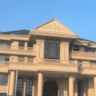 衢州黄金麻别墅外墙干挂石材效果示例