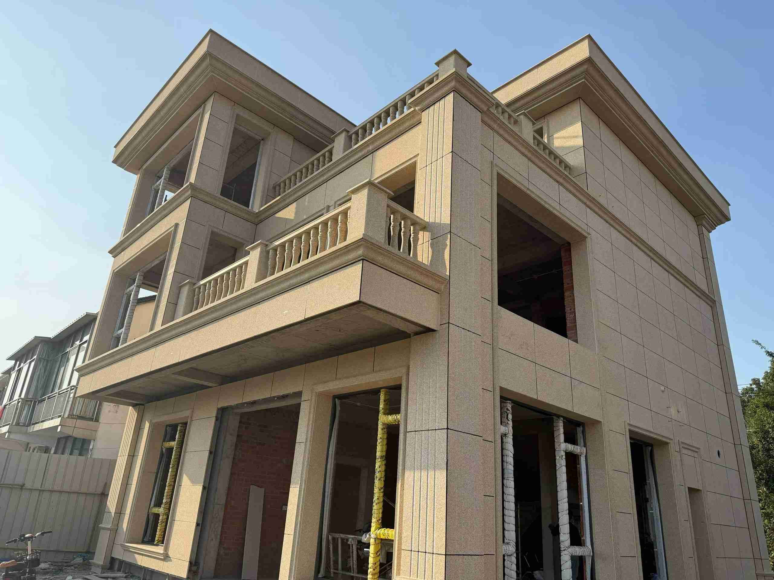 衢州 黄金麻花岗岩石材荔枝面外墙干挂效果展示